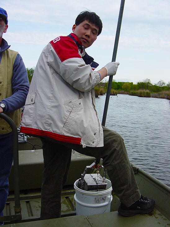 Photo: Collecting Sediment Samples.