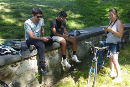 Photo: Group using their cell phones.