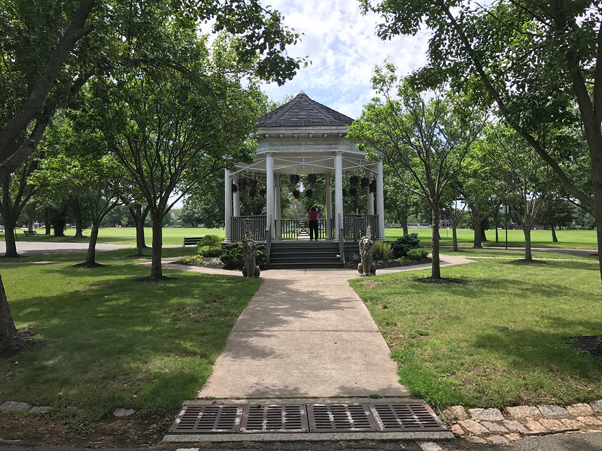 Photo of a white gazebo in a park in New Brunswick.